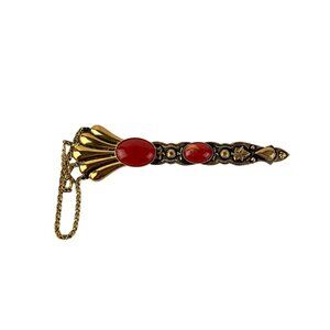 Vintage brooch with carnelian cabochons